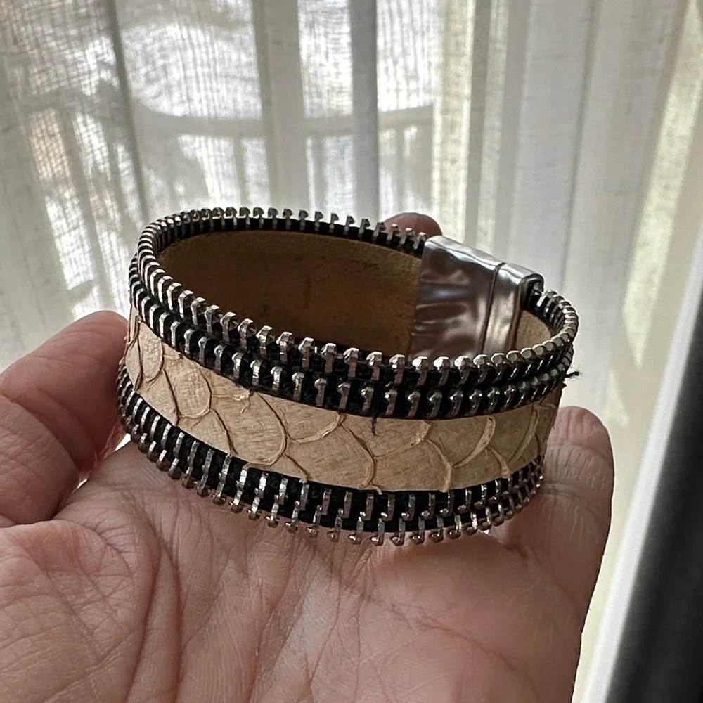 Black and silver zipper detail bracelet with tan snake-like band